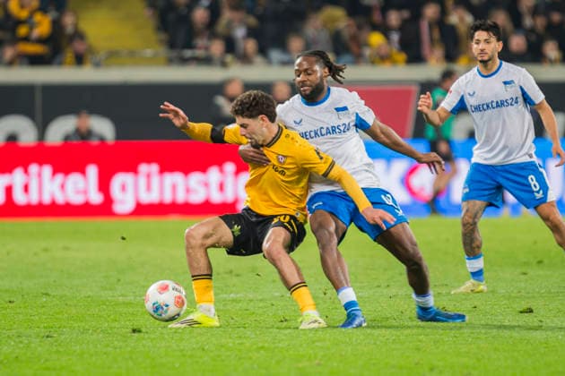 04 04 2026, xomx, Soccer 2 Bundesliga, Dynamo Dresden Hertha BSC Berlin v l Ben Justus Bobzien Dynamo Dresden and Deyo Deyovaisio Zeefuik Hertha BSC in a duel on the ball DFL DFB REGULATIONS PROHIBIT ANY USE OF PHOTOGRAPHS as IMAGE SEQUENCES and or QUASI VIDEO Dresden