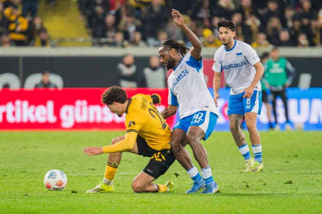 04 04 2026, xomx, Soccer 2 Bundesliga, Dynamo Dresden Hertha BSC Berlin v l Ben Justus Bobzien Dynamo Dresden and Deyo Deyovaisio Zeefuik Hertha BSC in a duel on the ball DFL DFB REGULATIONS PROHIBIT ANY USE OF PHOTOGRAPHS as IMAGE SEQUENCES and or QUASI VIDEO Dresden