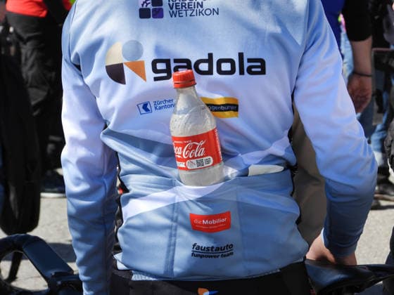 04 04 2026 Affoltern am Albis Switzerland GP Osterhas International Cycling Race Womens Race Picture Coca Cola bottle in the jersey pocket Action Beverages,