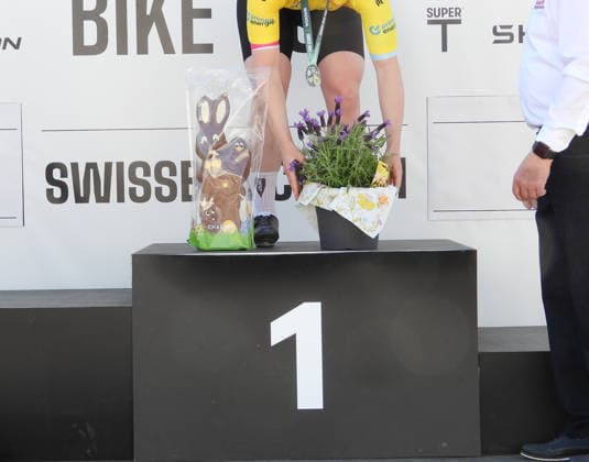 04 04 2026 Affoltern am Albis Switzerland GP Osterhas International Womens Cycling Race Picture, prizes for the winner, Easter bunny and flower stick action