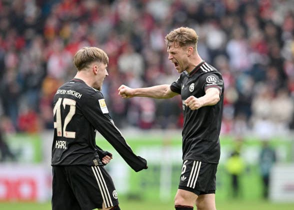 Sport Bilder des Tages #2 Jubel Lennart Karl (Bayern München) nach seinem Tor zum 2:3, mit Joshua Kimmich r. (Bayern München). Fussball 1. Bundesliga, 28.Spieltag, SC Freiburg - FC Bayern München 2:3, am 04.04.2026 in Freiburg Deutschland. DFL regulations prohibit any use of photographs as image sequences and or quasi-video Â *** Lennart Karl Bayern Munich cheers after his goal to 2 3, with Joshua Kimmich r Bayern Munich Football 1 Bundesliga, 28 Matchday, SC Freiburg FC Bayern Munich 2 3, on 04 04 2026 in Freiburg Germany DFL regulations prohibit any use of photographs as image sequences and or quasi video Â