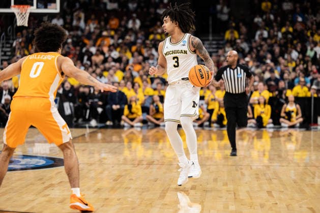 Michigan Wolverines Vs Tennessee Volunteers in Chicago, US - 29 Mar 2026 Eliot Cadeau (R) of the Michigan Wolverines in action against Ja’Kobi Gillespie (L) of the Tennessee Volunteers in the Elite Eight round of the NCAA, College League, USA Men s Basketball Tournament at the United Center. Final score; Michigan 95-62 Tennessee. Chicago United States Copyright: xNicholasxMullerx xSOPAxImagesx NMULLER_MICH_TENN_NCAAELITE8(3)