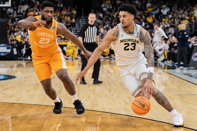 Michigan Wolverines Vs Tennessee Volunteers in Chicago, US - 29 Mar 2026 Yaxel Landeborg (R) of the Michigan Wolverines in action against Jaylen Carey (L) of the Tennessee Volunteers in the Elite Eight round of the NCAA, College League, USA Men s Basketball Tournament at the United Center. Final score; Michigan 95-62 Tennessee. Chicago United States Copyright: xNicholasxMullerx xSOPAxImagesx NMULLER_MICH_TENN_NCAAELITE8(5)