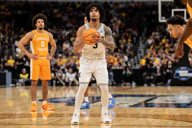 Michigan Wolverines Vs Tennessee Volunteers in Chicago, US - 29 Mar 2026 Eliot Cadeau of the Michigan Wolverines in action against the Tennessee Volunteers in the Elite Eight round of the NCAA, College League, USA Men s Basketball Tournament at the United Center. Final score; Michigan 95-62 Tennessee. Chicago United States Copyright: xNicholasxMullerx xSOPAxImagesx NMULLER_MICH_TENN_NCAAELITE8(20)
