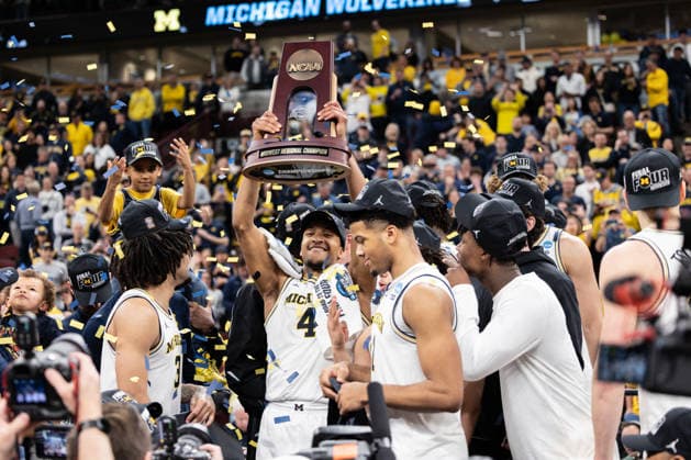 Michigan Wolverines Vs Tennessee Volunteers in Chicago, US - 29 Mar 2026 Nimari Burnett (C) of the Michigan Wolverines celebrates after a win against the Tennessee Volunteers in the Elite Eight round of the NCAA, College League, USA Men s Basketball Tournament at the United Center. Final score; Michigan 95-62 Tennessee. Chicago United States Copyright: xNicholasxMullerx xSOPAxImagesx NMULLER_MICH_TENN_NCAAELITE8(47)