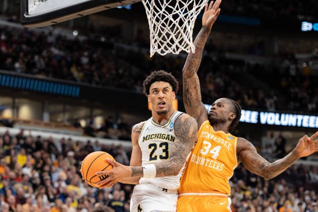 March 29, 2026, Chicago, Illinois, United States: Yaxel Landeborg (L) of the Michigan Wolverines in action against Felix Okpara (R) of the Tennessee Volunteers in the Elite Eight round of the NCAA, College League, USA Men s Basketball Tournament at the United Center. Final score; Michigan 95-62 Tennessee. Chicago United States - ZUMAs197 20260329_aaa_s197_885 Copyright: xNicholasxMullerx