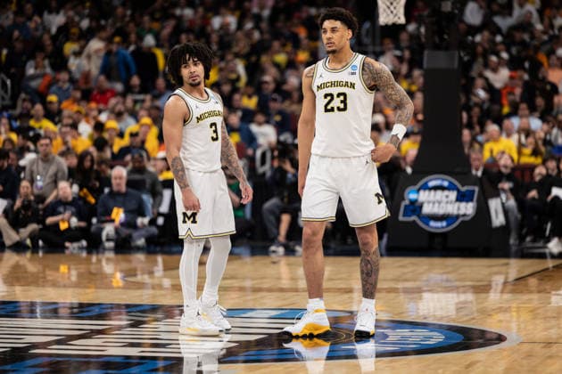 March 29, 2026, Chicago, Illinois, United States: Yaxel Landeborg (R) and Elliot Cadeau (L) of the Michigan Wolverines in action against the Tennessee Volunteers in the Elite Eight round of the NCAA, College League, USA Men s Basketball Tournament at the United Center. Final score; Michigan 95-62 Tennessee. Chicago United States - ZUMAs197 20260329_aaa_s197_888 Copyright: xNicholasxMullerx