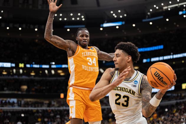 March 29, 2026, Chicago, Illinois, United States: Yaxel Lendeborg (R) of the Michigan Wolverines in action against Felix Okpara (L) of the Tennessee Volunteers in the Elite Eight round of the NCAA, College League, USA Men s Basketball Tournament at the United Center. Final score; Michigan 95-62 Tennessee. Chicago United States - ZUMAs197 20260329_aaa_s197_914 Copyright: xNicholasxMullerx