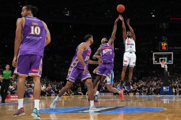 NBL KINGS 36ERS, Bryce Cotton of the 36ers shoots past Torrey Craig of the Kings during NBL grand final, game five, Sydney Kings v Adelaide 36ers, at Qudos Bank Arena in Sydney, Sunday, April 5, 2026. ( NO ARCHIVING, EDITORIAL USE ONLY SYDNEY NEW SOUTH WALES AUSTRALIA  Copyright: xROBBIExSTEPHENSONx 20260405114556344244