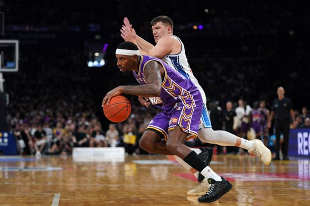 NBL KINGS 36ERS, Torrey Craig of the Kings and Dejan Vasilijevic of the 36ers compete for the ball during NBL grand final, game five, Sydney Kings v Adelaide 36ers, at Qudos Bank Arena in Sydney, Sunday, April 5, 2026. ( NO ARCHIVING, EDITORIAL USE ONLY SYDNEY NEW SOUTH WALES AUSTRALIA  Copyright: xROBBIExSTEPHENSONx 20260405146402169540