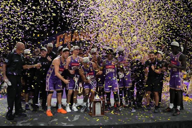 NBL KINGS 36ERS, The Kings celebrate with the Larry O™Brien Championship Trophy after being crowned champions during NBL grand final, game five, Sydney Kings v Adelaide 36ers, at Qudos Bank Arena in Sydney, Sunday, April 5, 2026. ( NO ARCHIVING, EDITORIAL USE ONLY SYDNEY NEW SOUTH WALES AUSTRALIA  Copyright: xROBBIExSTEPHENSONx 20260405134692765725