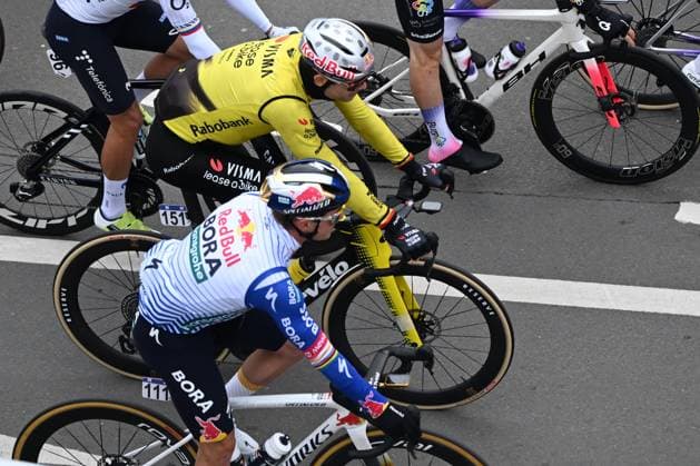 Belgian Remco Evenepoel of Red Bull-BORA-hansgrohe and Belgian Wout van Aert of Team Visma-Lease a Bike pictured at the start of the men s race of the Ronde van Vlaanderen Tour des Flandres Tour of Flanders UCI WorldTour one day cycling race, 278 km from Antwerp to Oudenaarde, Sunday 05 April 2026. ELIASxROM  x169850766x