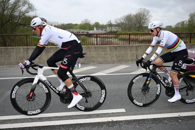 Ronde van Vlaanderen 2026 Cycling Race OUDENAARDE, BELGIUM - APRIL 05 : Politt Nils (GER) of UAE Team Emirates - XRG and Pogacar Tadej (SLO) of UAE Team Emirates - XRG during the 110th edition of Ronde van Vlaanderen an UCI World Tour 1.UWT one day cycling road race for Men Elite of 271 km with start in Antwerpen and finish in Oudenaarde on April 5, 2026 in Oudenaarde, Belgium, 05 04 2026 ( Motordriver Guy De Vuyst - Oudenaarde Belgium  Copyright: xNicoxVereeckenx