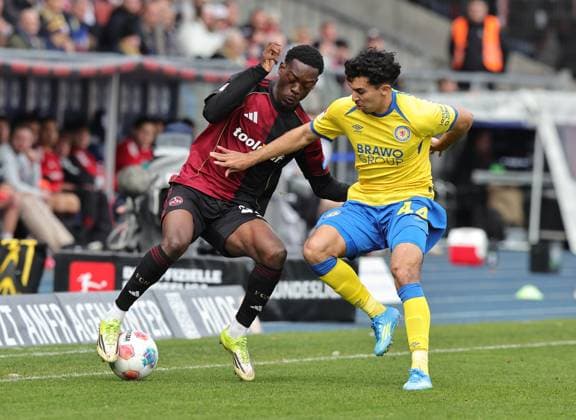 05 04 2026 Soccer Season 2025 2026 2 Soccer Bundesliga 28 Matchday Eintracht Braunschweig BTSV EBS 1 FC Nürnberg FCN Club Sportfoto Zink DaMa xdaxmax DFL regulations prohibit any use of photographs as image sequences and or quasi video only for editorial use Rabby Nzingoula 22, 1 FC Nürnberg FCN Johan Gomez 44, Eintracht Braunschweig BTSV EBS