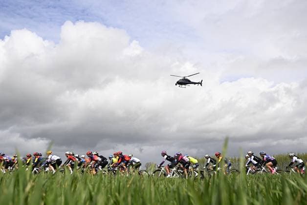 The pack of riders pictured in action during the women s race of the Ronde van Vlaanderen Tour des Flandres Tour of Flanders UCI WorldTour one day cycling race, 164,1 km with start and finish in Oudenaarde, Sunday 05 April 2026. JASPERxJACOBS  x169863538x