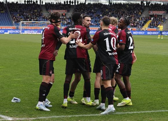 05 04 2026 Soccer Season 2025 2026 2 Soccer Bundesliga 28 Matchday Eintracht Braunschweig BTSV EBS 1 FC Nürnberg FCN Club Sportfoto Zink DaMa xdaxmax DFL regulations prohibit any use of photographs as image sequences and or quasi video only for editorial use Jubel Freude Torjubel nach Tor zum 0 1 Rabby Nzingoula 22, 1 FC Nuremberg FCN and team team cheers happy goalscorer Rabby Nzingoula 22, 1 FC Nuremberg FCN Fabio Gruber 4, 1 FC Nuremberg FCN Julian Justvan 10, 1 FC Nuremberg FCN send team team away from home curve