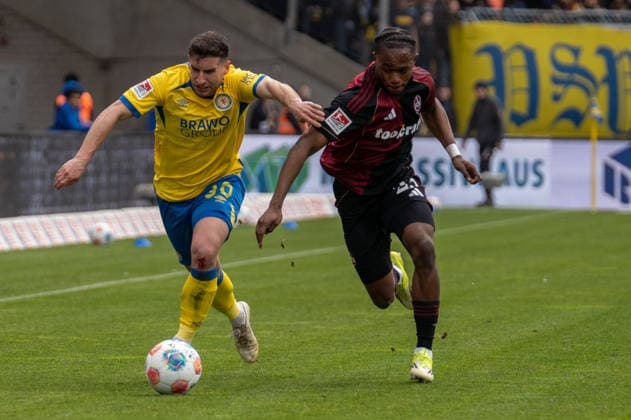 Germany Soccer, 2 Bundesliga, 28 Matchday 2025 26, Eintracht Braunschweig 1 FC Nürnberg on 05 04 in Braunschweig, Eintracht Stadion Robin Heußer Eintracht Braunschweig 30 Mohamed Ali Zoma 1 FC Nürnberg 23 Copyright: xSvenxHeidmannx