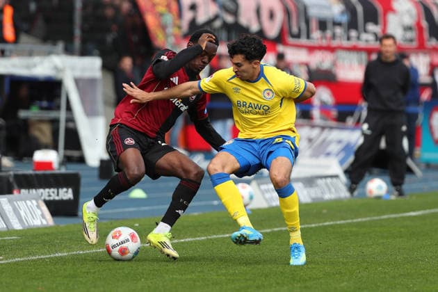 Braunschweig vs Nuremberg 2 BL Braunschweig, 05 04 2026, Football, Men, 2 BL, Season 2025 2026, Eintracht Braunschweig vs 1 FC Nürnberg Rabby Nzingoula 1 FC Nürnberg , Johan Gomez Eintracht Braunschweig DFL DFB REGULATIONS PROHIBIT ANY USE OF PHOTOGRAPHS as IMAGE SEQUENCES and or QUASI VIDEO Stadion an der Hamburger Straße Niedersachsen Germany