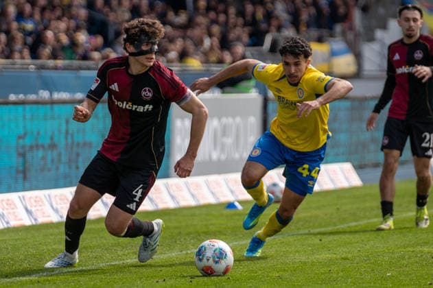 Germany Soccer, 2 Bundesliga, Matchday 28 2025 26, Eintracht Braunschweig 1 FC Nürnberg on 05 04 in Braunschweig, Eintracht Stadion Fabio Gruber 1 FC Nürnberg 4 Johan Gomez Eintracht Braunschweig 44 Copyright: xSvenxHeidmannx