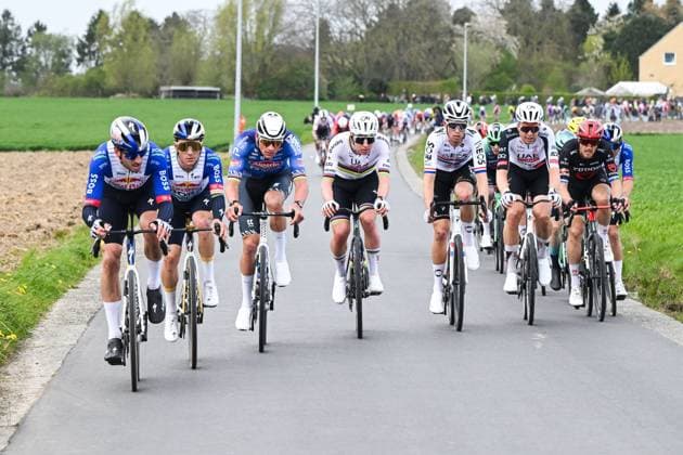 Dutch Tim Van Dijke of Red Bull-BORA-hansgrohe, Belgian Remco Evenepoel of Red Bull-BORA-hansgrohe, Dutch Mathieu van der Poel of Alpecin-Premier Tech, Slovenian Tadej Pogacar of UAE Team Emirates-XRG, British Samuel Watson of INEOS Grenadiers, Belgian Florian Vermeersch of UAE Team Emirates-XRG and Italian Matteo Trentin of Tudor Pro Cycling Team pictured in action during the men s race of the Ronde van Vlaanderen Tour des Flandres Tour of Flanders UCI WorldTour one day cycling race, 278km with start and finish in Antwerpen, Sunday 05 April 2026. POOLxDARIOxBELINGHERI  x169868229x