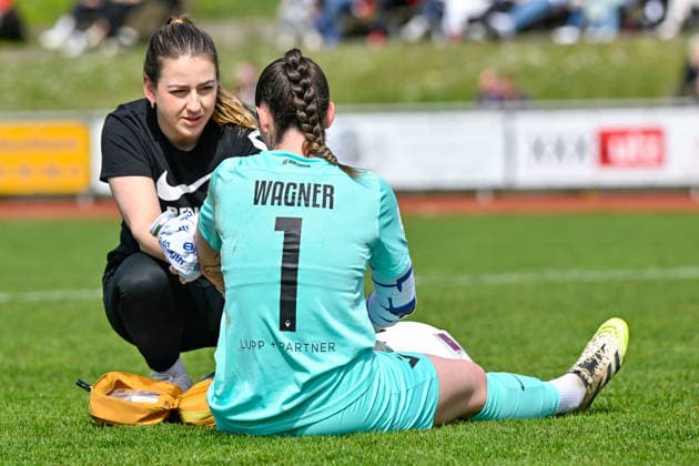Melanie Wagner Goalkeeper, Viktoria Berlin, 1 must be treated on the pitch, in pain after a foul, racked with pai, hurt, injury, injured, sporting injury, 05 04 2026, Aschheim Germany , Football,2 Womens Bundesliga, FC Bayern München II Viktoria Berlin, DFB DFL REGULATIONS PROHIBIT ANY USE OF PHOTOGRAPHS AS IMAGE SEQUENCES AND OR QUASI VIDEO xslx
