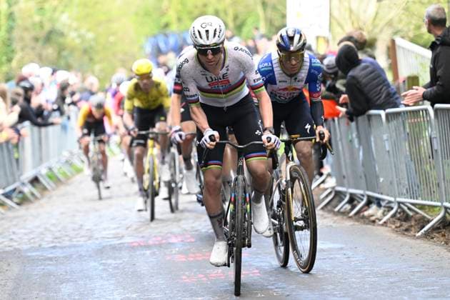 Ronde van Vlaanderen 2026 Cycling Race OUDENAARDE, BELGIUM - APRIL 05 : Pogacar Tadej (SLO) of UAE Team Emirates - XRG, Evenepoel Remco (BEL) of Red Bull - BORA - Hansgrohe during the 110th edition of Ronde van Vlaanderen an UCI World Tour 1.UWT one day cycling road race for Men Elite of 271 km with start in Antwerpen and finish in Oudenaarde on April 5, 2026 in Oudenaarde, Belgium, 05 04 2026 ( Motordriver Guy De Vuyst - Oudenaarde Belgium  Copyright: xNicoxVereeckenx