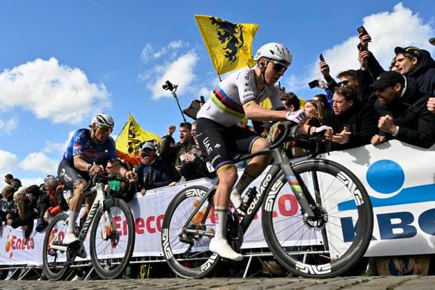 Ronde van Vlaanderen 2026 Cycling Race OUDENAARDE, BELGIUM - APRIL 05 : Pogacar Tadej (SLO) of UAE Team Emirates - XRG, Van Der Poel Mathieu (NED) of Alpecin - Premier Tech on the Paterberg climb during the 110th edition of Ronde van Vlaanderen an UCI World Tour 1.UWT one day cycling road race for Men Elite of 271 km with start in Antwerpen and finish in Oudenaarde on April 5, 2026 in Oudenaarde, Belgium, 05 04 2026 ( Motordriver Guy De Vuyst - Oudenaarde Belgium  Copyright: xJanxDexMeuleneirx