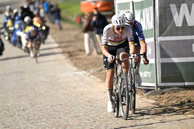Ronde van Vlaanderen 2026 Cycling Race OUDENAARDE, BELGIUM - APRIL 05 : Pogacar Tadej (SLO) of UAE Team Emirates - XRG, Van Der Poel Mathieu (NED) of Alpecin - Premier Tech during the 110th edition of Ronde van Vlaanderen an UCI World Tour 1.UWT one day cycling road race for Men Elite of 271 km with start in Antwerpen and finish in Oudenaarde on April 5, 2026 in Oudenaarde, Belgium, 05 04 2026 ( Motordriver Guy De Vuyst - Oudenaarde Belgium  Copyright: xNicoxVereeckenx