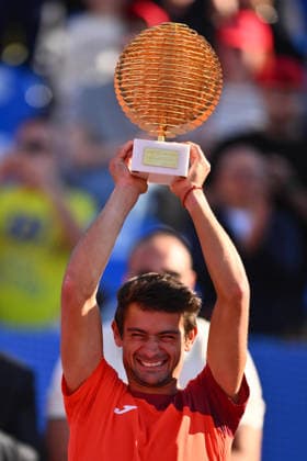 Tiriac Open final, Navove v Merida Mariano Navone of Argentina shows the trophy after after winning the game against Daniel Merida of Spain during the Tiriac Open finals, in Bucharest, April 05, 2026. Alex Nicodim Imago Images Copyright: xAlexxNicodimx