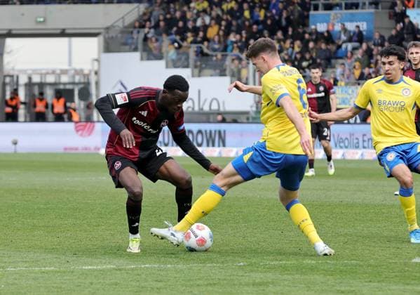 05 04 2026 Soccer Season 2025 2026 2 Soccer Bundesliga 28 Matchday Eintracht Braunschweig BTSV EBS 1 FC Nürnberg FCN Club Sportfoto Zink DaMa xdaxmax DFL regulations prohibit any use of photographs as image sequences and or quasi video only for editorial use Rabby Nzingoula 22, 1 FC Nürnberg FCN Florian Flick 6, Eintracht Braunschweig BTSV EBS
