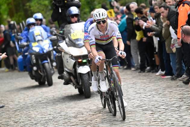 Ronde van Vlaanderen 2026 Cycling Race OUDENAARDE, BELGIUM - APRIL 05 : Pogacar Tadej (SLO) of UAE Team Emirates - XRG, Van Der Poel Mathieu (NED) of Alpecin - Premier Tech during the 110th edition of Ronde van Vlaanderen an UCI World Tour 1.UWT one day cycling road race for Men Elite of 271 km with start in Antwerpen and finish in Oudenaarde on April 5, 2026 in Oudenaarde, Belgium, 05 04 2026 ( Motordriver Guy De Vuyst - Oudenaarde Belgium  Copyright: xNicoxVereeckenx