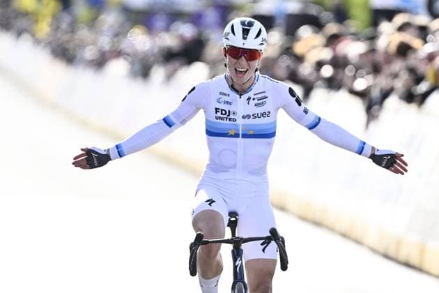 Dutch Demi Vollering of FDJ United-Suez celebrates as she crosses the finish line to win the women s race of the Ronde van Vlaanderen Tour des Flandres Tour of Flanders UCI WorldTour one day cycling race, 164,1 km with start and finish in Oudenaarde, Sunday 05 April 2026. ERICxLALMAND  x169887222x