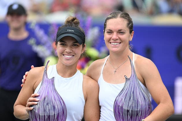 April 5, 2026, Charleston, South Carolina, SC: DESIRAE KRAWCZYK of the United States and CATHERINE MCNALLY of the United States pose with the Credit One Charleston Open doubles champions trophy following their defeat of ANNA BONDAR of Hungary and MAGDALENA FRECH of Poland at Credit One Stadium on April 3rd, 2026 in Charleston, SC. Charleston SC - ZUMAv134 20260405_zsp_v134_035 Copyright: xMaxwellxVittoriox