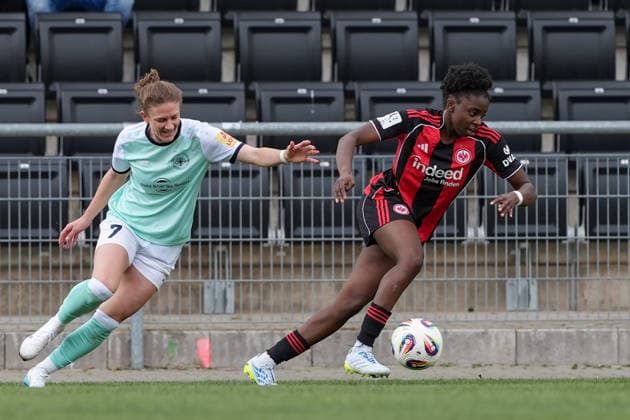 05 04 2026, Football, 2 Womens Bundesliga, 2025 2026, Matchday 22, Eintracht Frankfurt II SG 99 Andernach Emily Wallrabenstein Eintracht Frankfurt II captures the ball from Carolin Schraa 7 SG 99 Andernach Frankfurt am Main Stadion am Brentanobad Hessen Germany