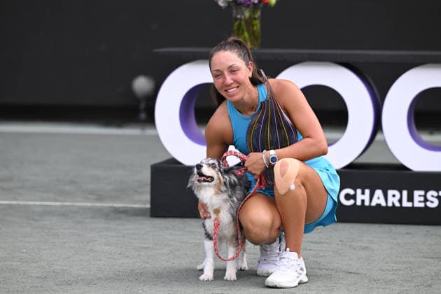 April 5, 2026, Charleston, South Carolina, SC: JESSICA PEGULA of the United States poses with her dog and the Credit One Charleston Open championship trophy following her victory against YULIIA STARODUBTSEVA of Ukraine during the Credit One Charleston Open at Credit One Stadium on April 3rd, 2026 in Charleston, SC. Tennis 2026: Charleston Open Finals  - ZUMAv134 20260405_zsp_v134_036 Copyright: xMaxwellxVittoriox