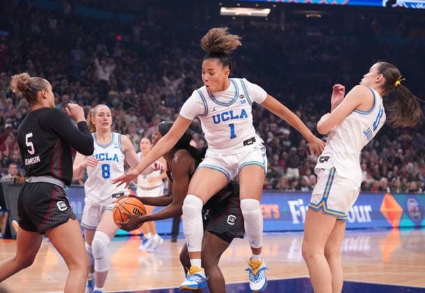 UCLA guard Kiki Rice (1) fights for the ball against the South Carolina Gamecocks in the first half of the Finals of the 2026 NCAA, College League, USA Women s Basketball Tournament at Mortgage Matchup Center in Phoenix, Arizona, on Sunday, April 5, 2026.  AZP20260405902 DARRYLxWEBB