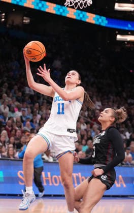 UCLA forward Gabriela Jaquez (11) goes in for a layup against South Carolina guard Tessa Johnson (5) in the second half of the Finals of the 2026 NCAA, College League, USA Women s Basketball Tournament at Mortgage Matchup Center in Phoenix, Arizona, on Sunday, April 5, 2026.  AZP20260405933 DARRYLxWEBB