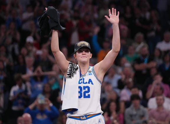 UCLA forward Angela Dugalic (32) waves to fans after the Bruins defeated South Carolina in the Finals of the 2026 NCAA, College League, USA Women s Basketball Tournament at Mortgage Matchup Center in Phoenix, Arizona, on Sunday, April 5, 2026. UCLA defeated South Carolina 79-51 to win their first-ever women s NCAA Tournament championship.  AZP20260405978 DARRYLxWEBB