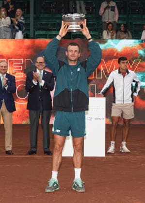 HOUSTON, TX - APRIL 05: Tommy Paul (USA) holds up the winner™s trophy during the singles finals of the Men™s Clay Court Championship on April 5, 2026 at River Oaks Country Club in Houston, Texas. (Photo by Leslie Plaza Johnson Icon Sportswire) TENNIS: APR 05 US Men s Clay Court Championship EDITORIAL USE ONLY Icon260405096
