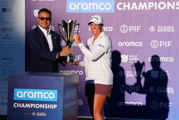 LAS VEGAS, NV - APRIL 05: LPGA, Golf Damen golfer Lauren Coughlin is presented the trophy by Aramco CEO after winning the Aramco Championship on April 5, 2026, at Shadow Creek Golf Course in Las Vegas, Nevada. (Photo by Brian Spurlock Icon Sportswire) GOLF: APR 05 LPGA Aramco Championship EDITORIAL USE ONLY Icon26040571