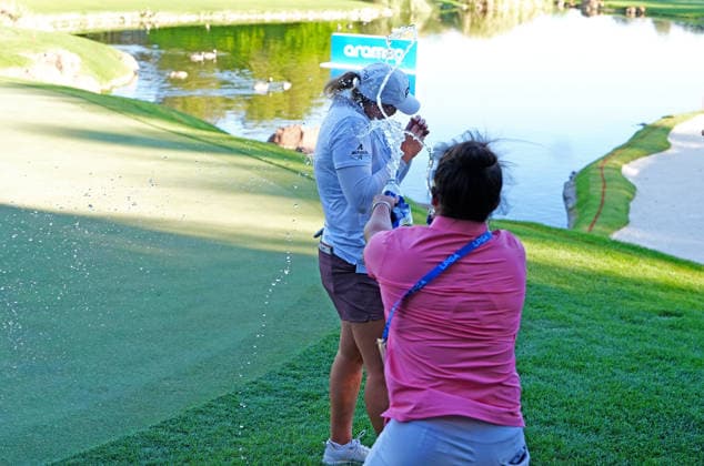 LAS VEGAS, NV - APRIL 05: LPGA, Golf Damen golfer Lauren Coughlin gets sprayed with water as she walks off the 18th green after winning the Aramco Championship on April 5, 2026, at Shadow Creek Golf Course in Las Vegas, Nevada. (Photo by Brian Spurlock Icon Sportswire) GOLF: APR 05 LPGA Aramco Championship EDITORIAL USE ONLY Icon26040581
