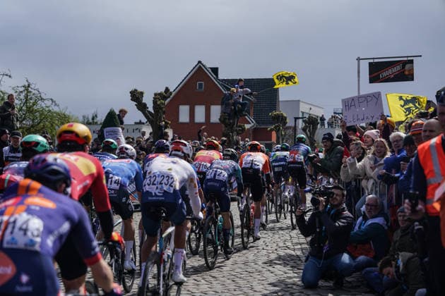 (260406) -- HAALTERT, April 6, 2026 -- Supporters cheer for the riders during the Tour of Flanders cycling race in Haaltert on April 5, 2026. ) (SP)BELGIUM-HAALTERT-CYCLING-TOUR OF FLANDERS PengxZiyang 