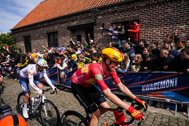 (260406) -- HAALTERT, April 6, 2026 -- Supporters cheer for the riders during the Tour of Flanders cycling race in Haaltert on April 5, 2026. ) (SP)BELGIUM-HAALTERT-CYCLING-TOUR OF FLANDERS PengxZiyang 
