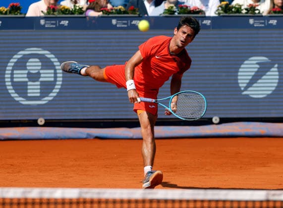 (260406) -- BUCHAREST, April 6, 2026 -- Mariano Navone of Argentina serves the ball to Daniel Merida of Spain during the final match of ATP, Tennis Herren 250 Tiriac Open tennis tournament in Bucharest, Romania, April 5, 2026. (Photo by Xinhua) (SP)ROMANIA-BUCHAREST-TENNIS-ATP 250 TIRIAC OPEN CristianxCristel 