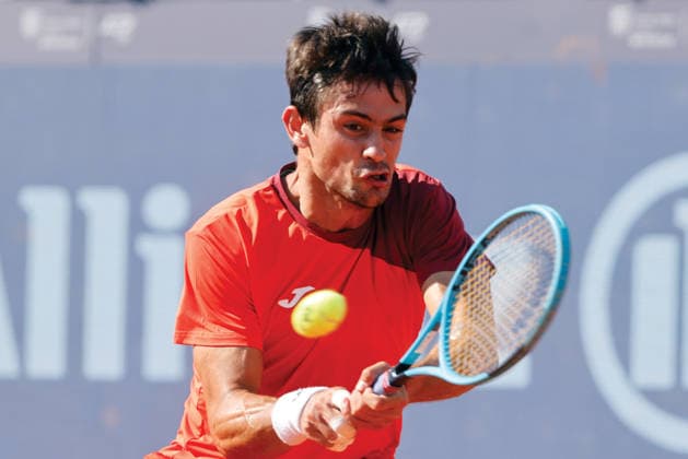 (260406) -- BUCHAREST, April 6, 2026 -- Mariano Navone of Argentina returns the ball to Daniel Merida of Spain during the final match of ATP, Tennis Herren 250 Tiriac Open tennis tournament in Bucharest, Romania, April 5, 2026. (Photo by Xinhua) (SP)ROMANIA-BUCHAREST-TENNIS-ATP 250 TIRIAC OPEN CristianxCristel 