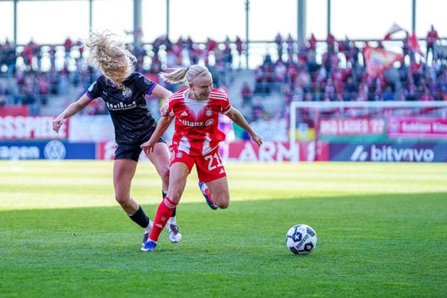 Julie Terlinden 2 Essen and Pernille Harder 21 Bayern in action at the DFB Cup semi-final FC Bayern Munich SGS Essen on 06 04 2026 in Munich Munich FC Bayern Campus Bayern Germany