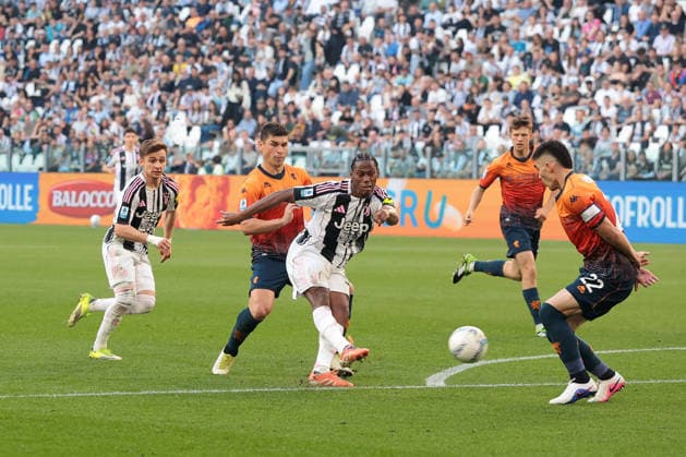 Turin, Italy, 6th April 2026. Jonathan David of Juventus fires a shot goalwards only to hit the inside of the upright and rebound into play during the Juventus vs Genoa Serie A match at Allianz Stadium, Turin. Picture credit should read: Jonathan Moscrop Sportimage EDITORIAL USE ONLY. No use with unauthorised audio, video, data, fixture lists, club league logos or live services. Online in-match use limited to 120 images, no video emulation. No use in betting, games or single club league player publications. SPI_021_JM_JUVE_GENOA SPI-4644-0021