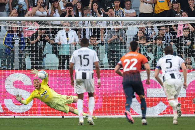 Turin, Italy, 6th April 2026. Michele Di Gregorio of Juventus saves a penalty from Aaron Martin of Genoa CFC during the Juventus vs Genoa Serie A match at Allianz Stadium, Turin. Picture credit should read: Jonathan Moscrop Sportimage EDITORIAL USE ONLY. No use with unauthorised audio, video, data, fixture lists, club league logos or live services. Online in-match use limited to 120 images, no video emulation. No use in betting, games or single club league player publications. SPI_025_JM_JUVE_GENOA SPI-4644-0025