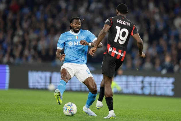 Italy: Serie a football match SSC Napoli vs AC Milan Napoli s Cameroonian midfielder Andre Frank Zambo Anguissa challenges for the ball with Milan™s French midfielder Youssouf Fofana during the Serie A football match between SSC Napoli and AC Milan at the Diego Armando Maradona Stadium in Naples on April 06, 2026. _BPH7061 Copyright: xAntonioxBalascox