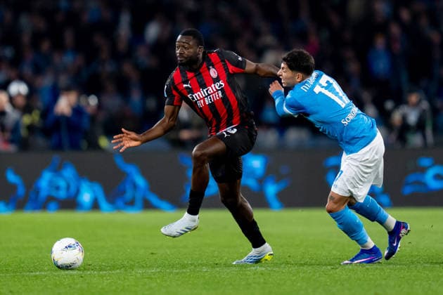 SSC Napoli v AC Milan - Serie A Enilive Youssouf Fofana of AC Milan and Mathias Olivera of SSC Napoli compete for the ball during the serie Serie A Enilive match between SSC Napoli and AC Milan at Stadio Diego Armando Maradona on April 6, 2026 in Naples, Italy Naples Stadio Diego Armando Maradona Naples Italy Copyright: xGiuseppexMaffiax 260406_SerieA_Napoli-Milan_03954